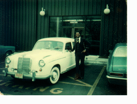 Ernie with an old automobile